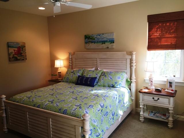 136 South Zander Way Santa Rosa Beach, FL 32459 - Photo 14 of 27 a bedroom with a bed and a window