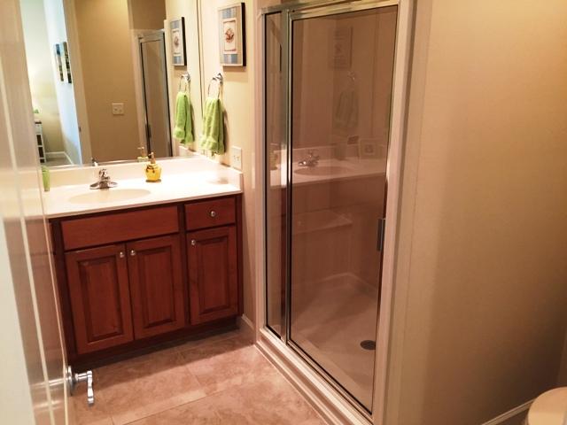 136 South Zander Way Santa Rosa Beach, FL 32459 - Photo 15 of 27 a bathroom with a sink and a mirror