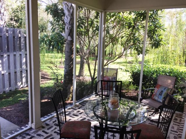 136 South Zander Way Santa Rosa Beach, FL 32459 - Photo 22 of 27 a view of backyard with outdoor seating and green space