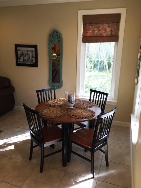 136 South Zander Way Santa Rosa Beach, FL 32459 - Photo 4 of 27 a view of a dining room with furniture and window