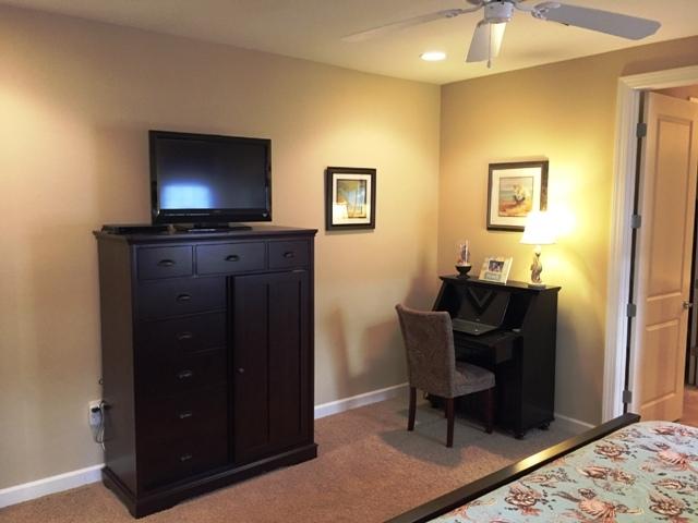 136 South Zander Way Santa Rosa Beach, FL 32459 - Photo 8 of 27 a living room with furniture and a flat screen tv