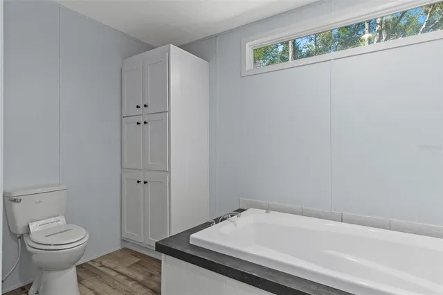 a bathroom with a sink and a toilet