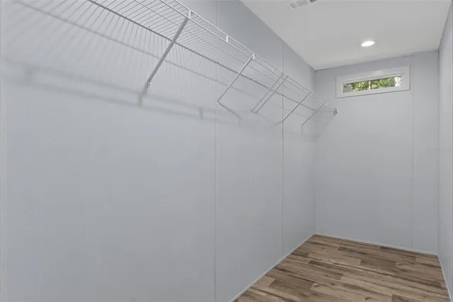 a view of a room with racks on the wall