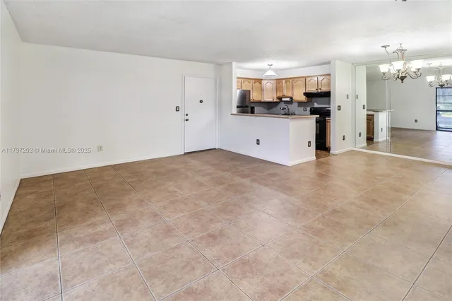 a view of a kitchen with a sink