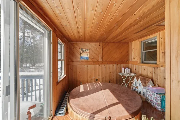 a view of a dining room with furniture window and outside view