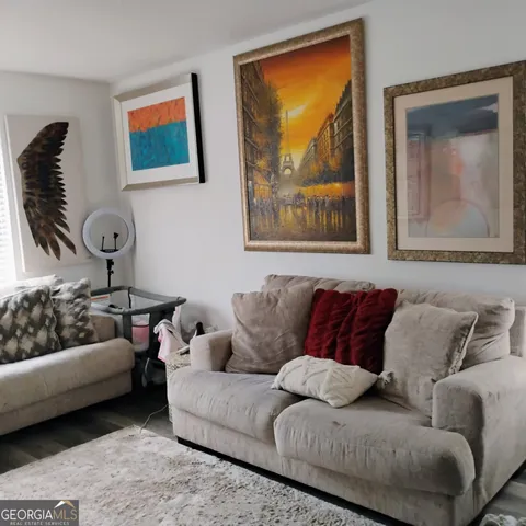 a living room with furniture and a couch