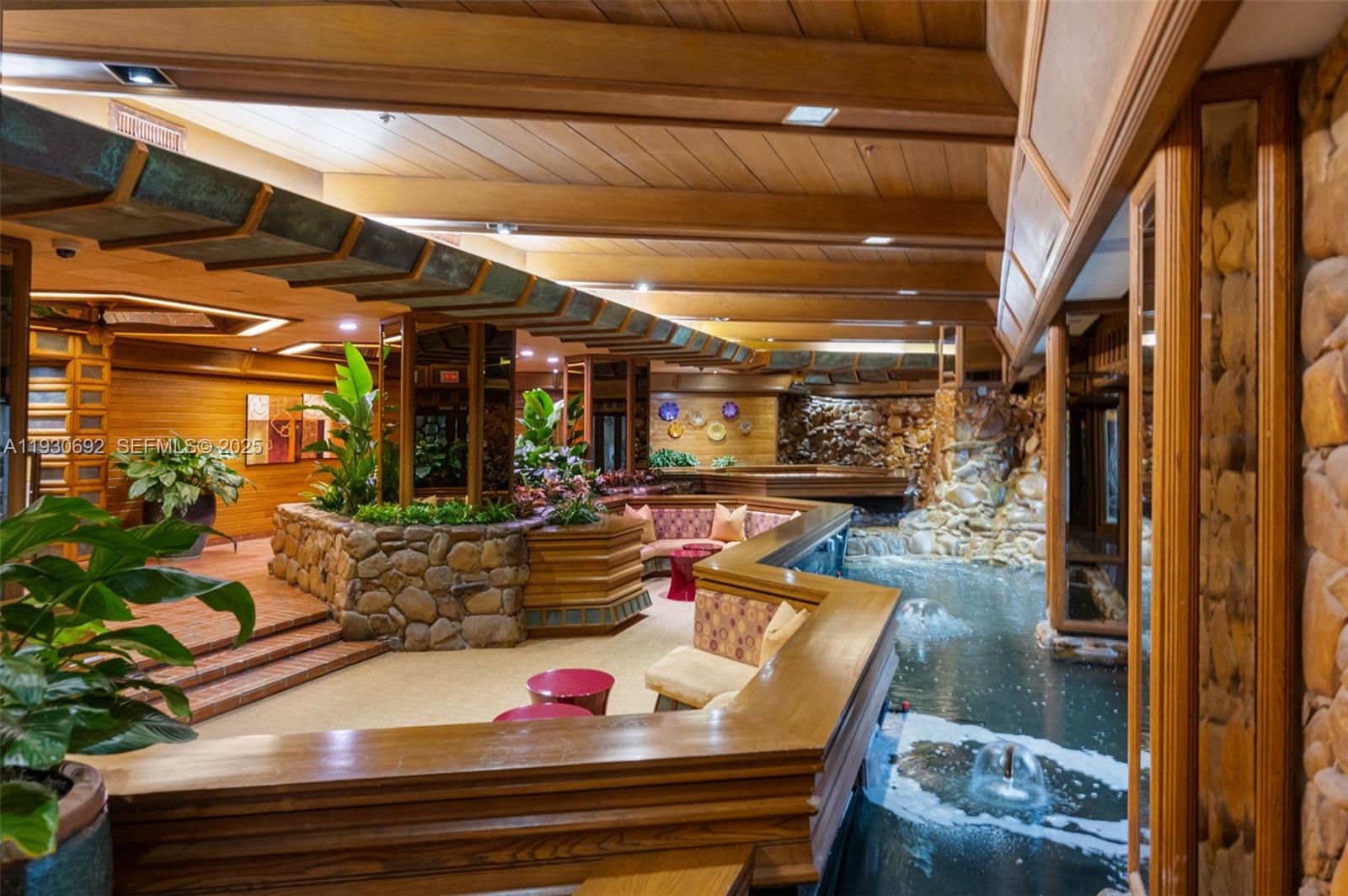 2000 Towerside Terrace, Unit 412 Miami, FL 33138 - Photo 24 of 57 a outdoor living space with patio furniture