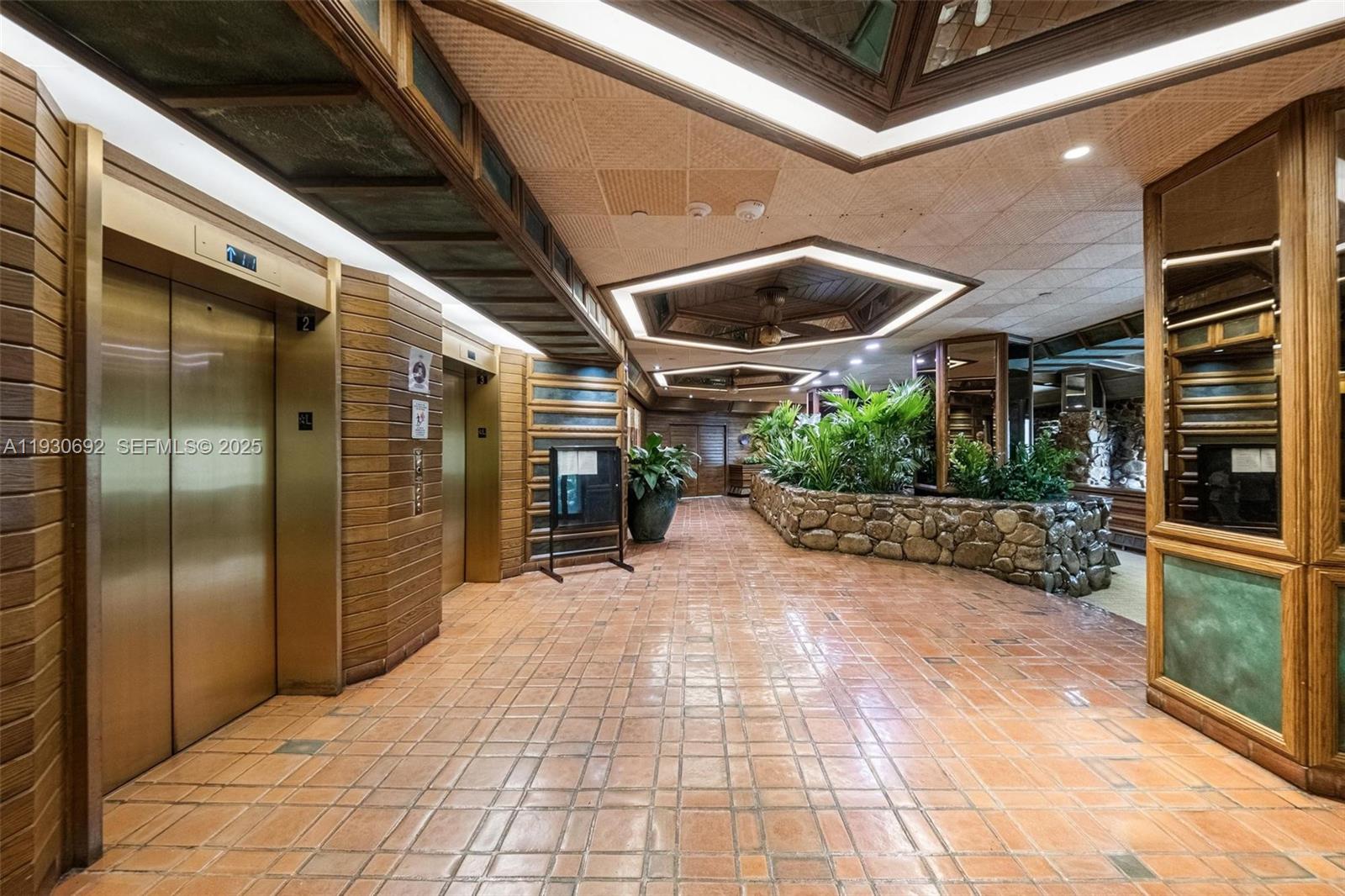 2000 Towerside Terrace, Unit 412 Miami, FL 33138 - Photo 25 of 57 a view of a building with a door