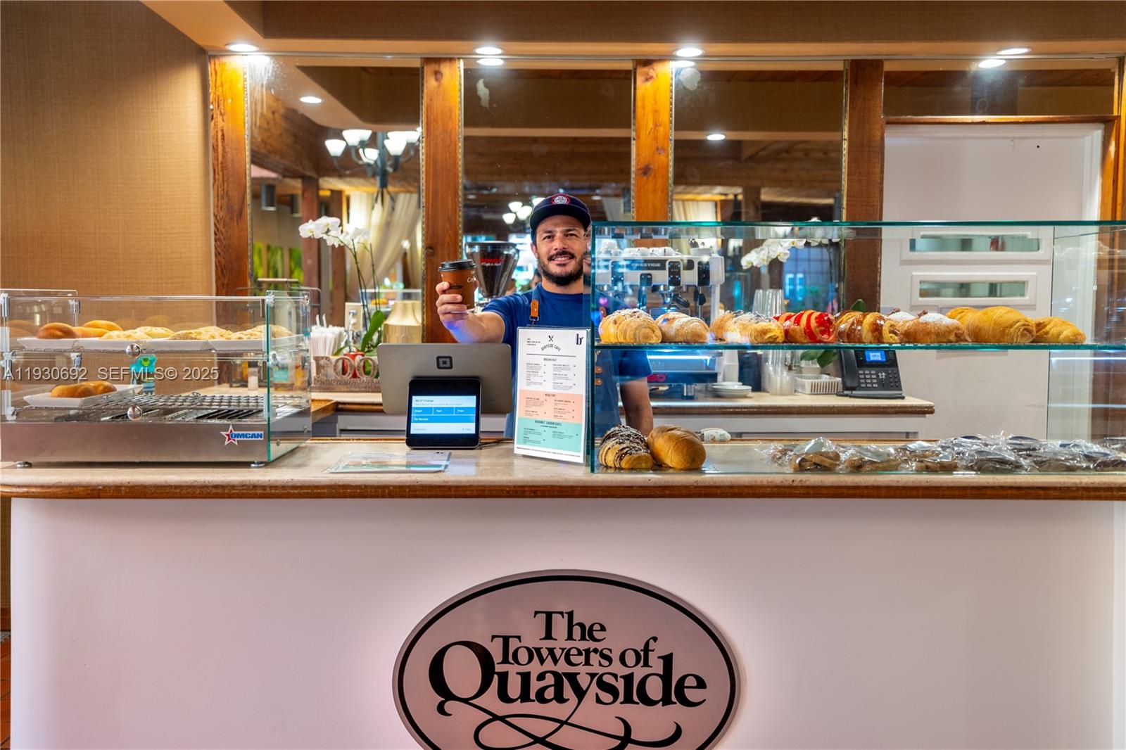 2000 Towerside Terrace, Unit 412 Miami, FL 33138 - Photo 54 of 57 a kitchen with a sink and a stove top oven