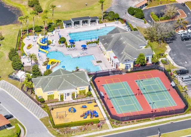 a view of multiple houses with outdoor space