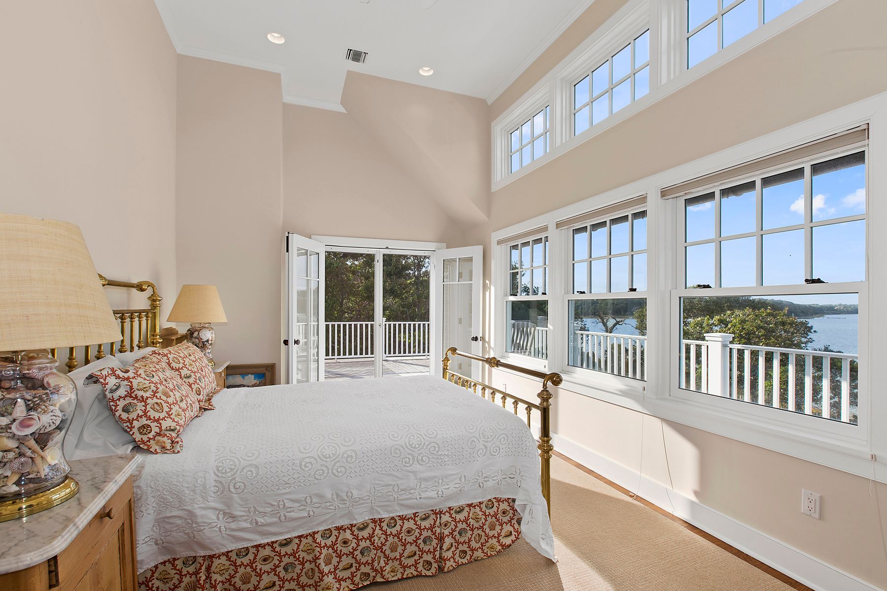 182 Springy Banks Road East Hampton, NY 11937 - Photo 6 of 12 a bed room with a bed and a large window