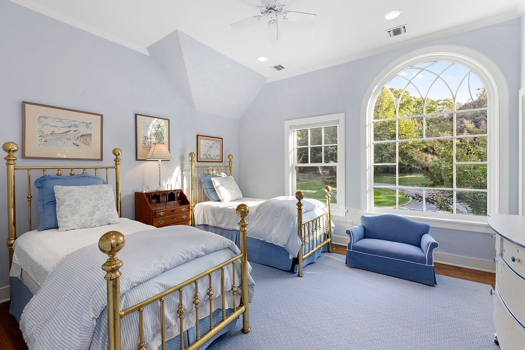 182 Springy Banks Road East Hampton, NY 11937 - Photo 9 of 12 a spacious bedroom with two beds and a large window