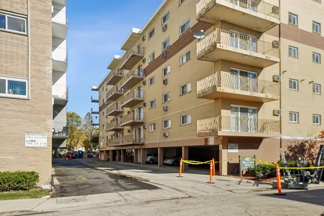 a front view of a building and a street