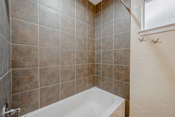 a bathroom with a bathtub