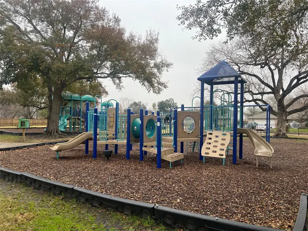 a view of a house with backyard patio and backyard
