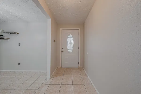 a view of a room with white walls