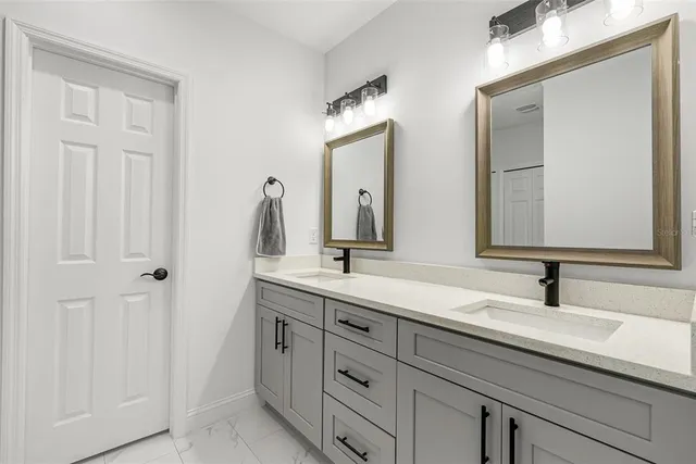 an aerial view of house with yard