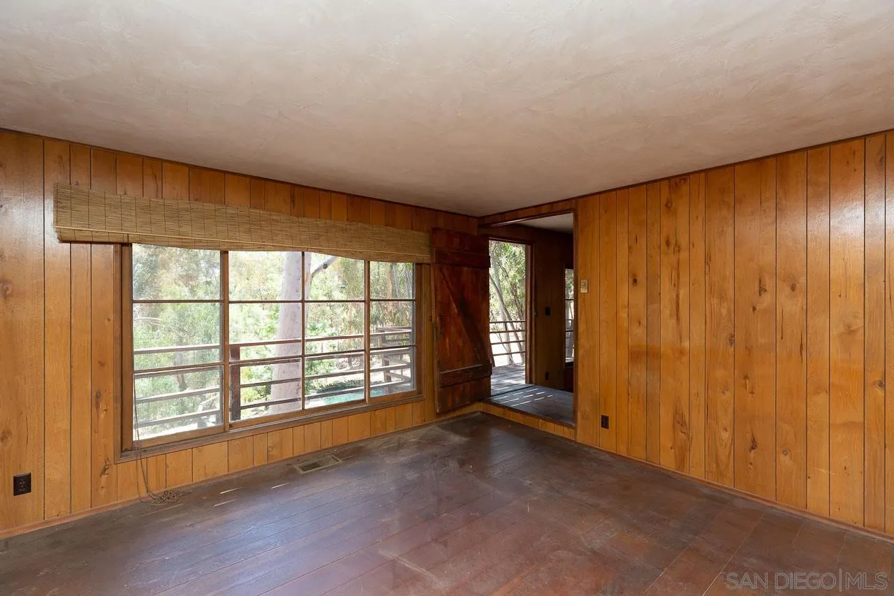 11855 Rocoso Road Lakeside, CA 92040 - Photo 6 of 16 an empty room with windows