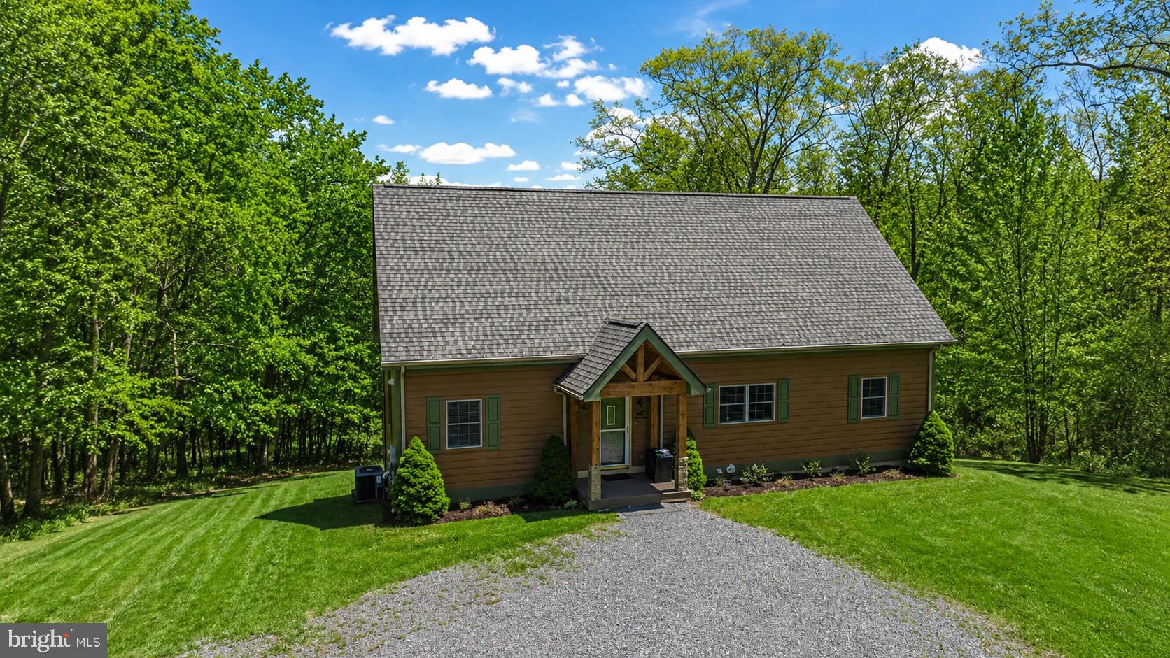 2828 Glendale Road Swanton, MD 21561 - Photo 73 of 78 a front view of house with a garden