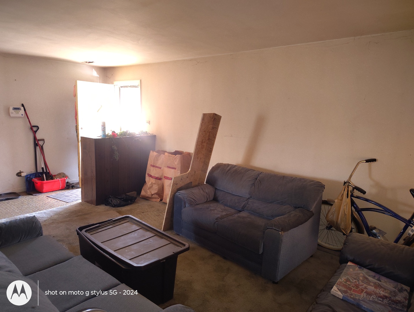550 West 127th Street Chicago, IL 60628 - Photo 5 of 19 a living room with furniture and a window