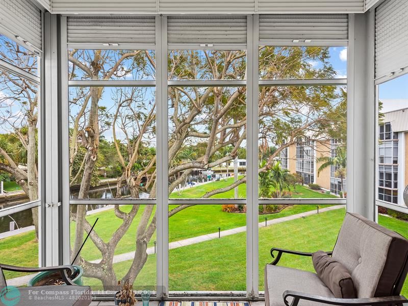 2990 Northeast 16th Avenue, Unit C306 Oakland Park, FL 33334 - Photo 2 of 11 a view of swimming pool from a room