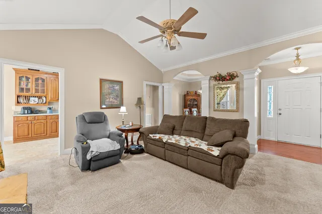 a kitchen with stainless steel appliances granite countertop a stove and cabinets