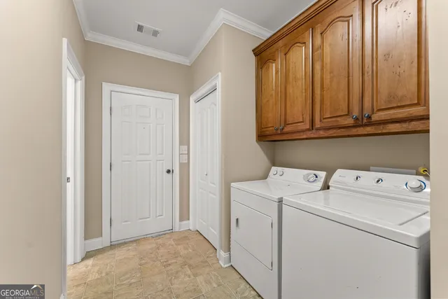 a bed room with a bed and a chandelier