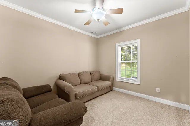 a view of a bathroom with a shower and a sink