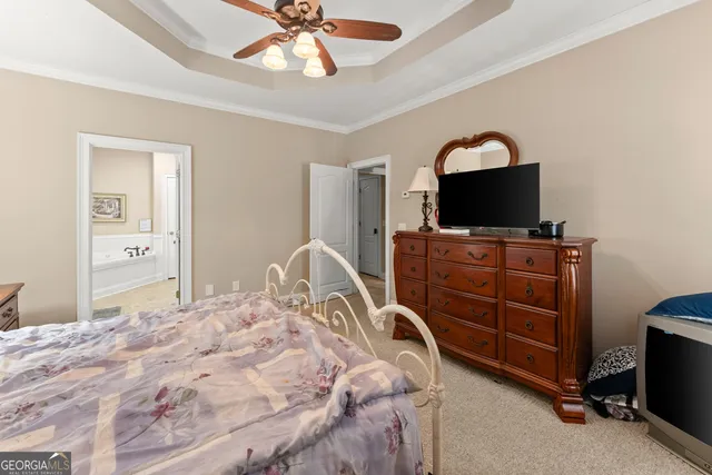a view of a deck with couches table and chairs with wooden floor and fence