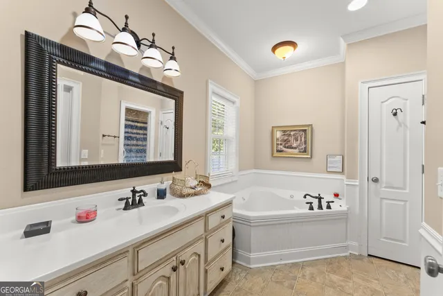 a view of a patio with a table and chairs under an umbrella