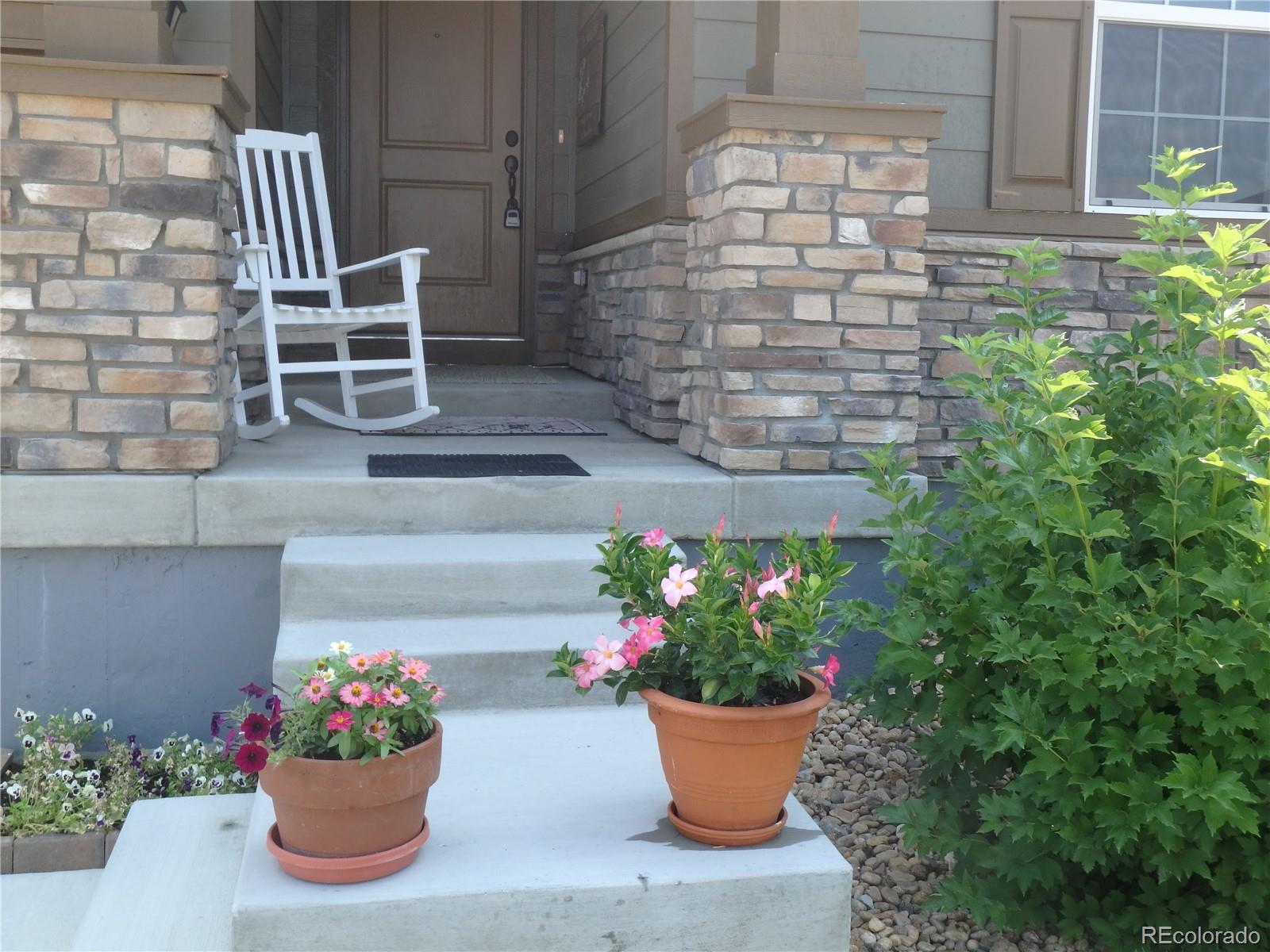 3268 Raintree Lane Dacono, CO 80514 - Photo 2 of 35 a view of outdoor space and garden