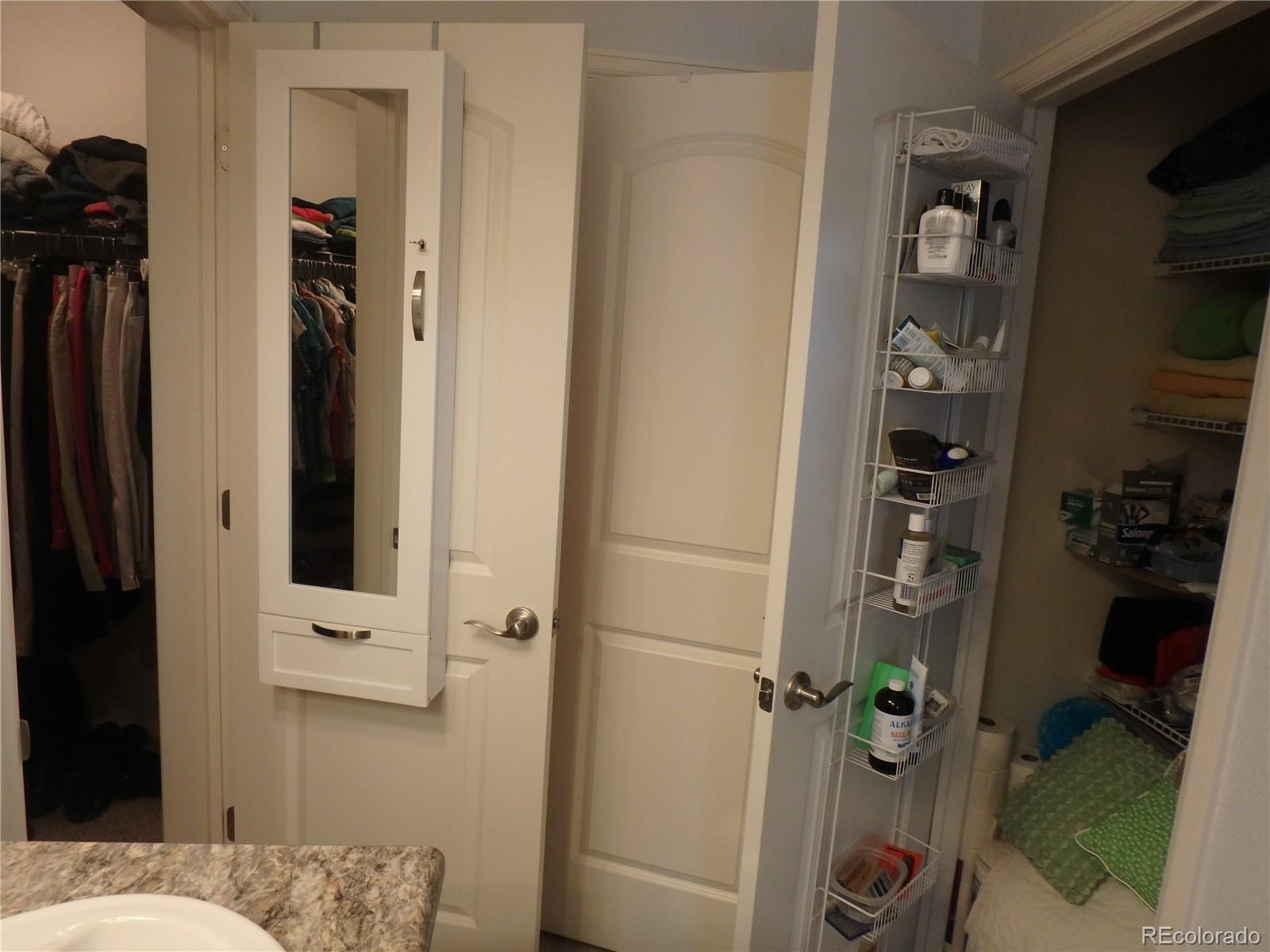 3268 Raintree Lane Dacono, CO 80514 - Photo 22 of 35 a bathroom with a shower