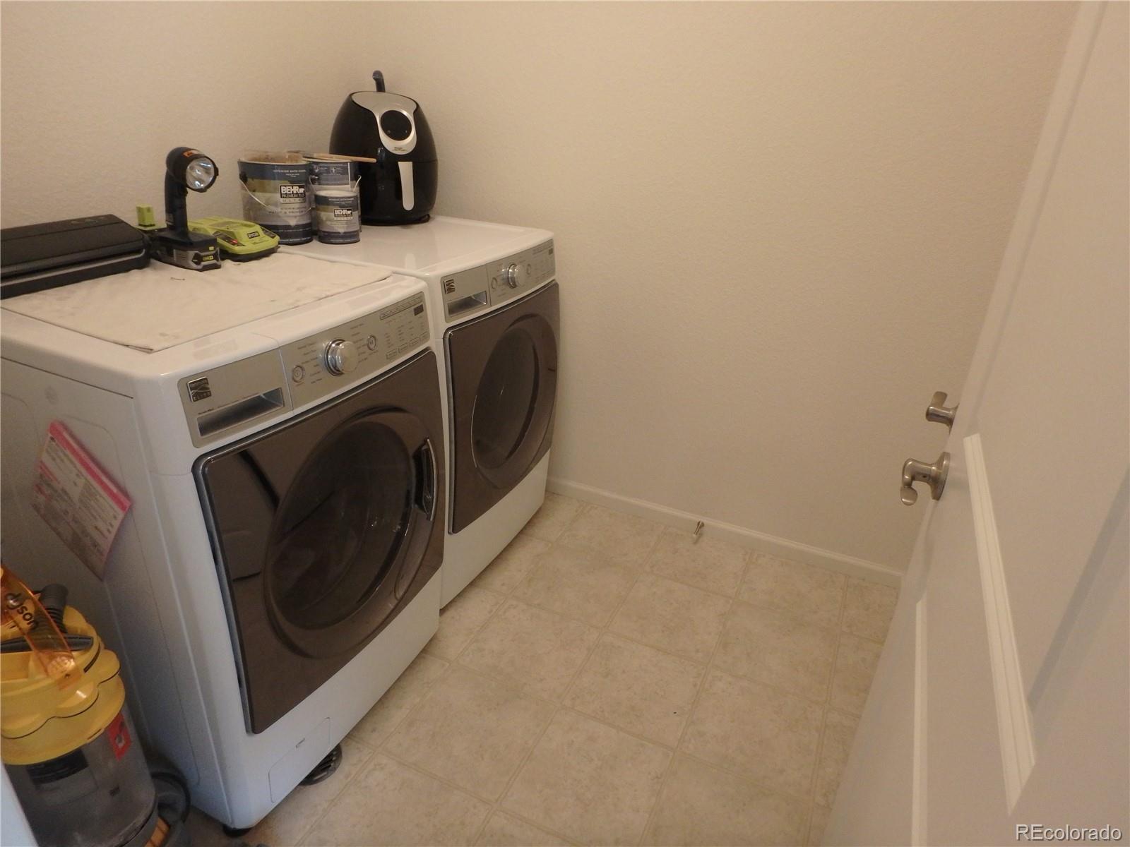 3268 Raintree Lane Dacono, CO 80514 - Photo 24 of 35 a utility room with dryer and washer