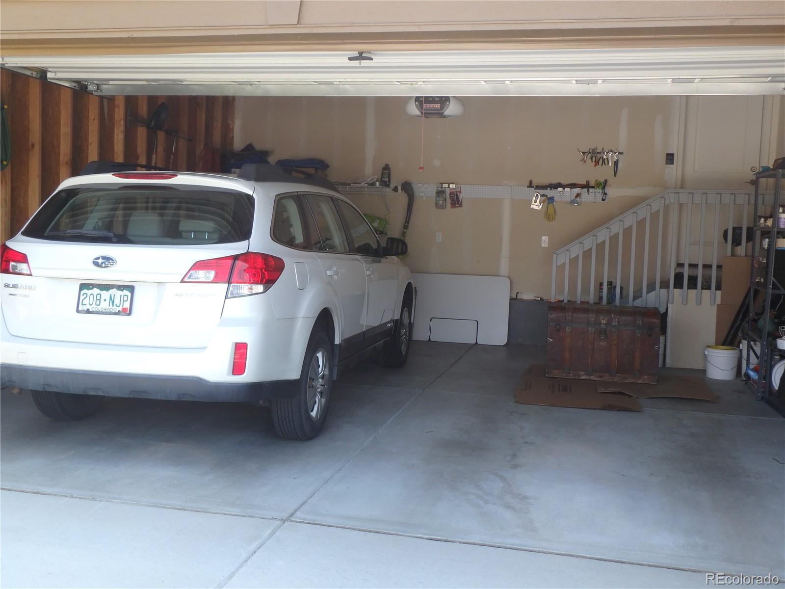 3268 Raintree Lane Dacono, CO 80514 - Photo 26 of 35 a view of garage