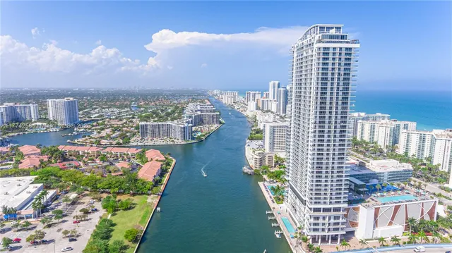 a view of city with tall buildings