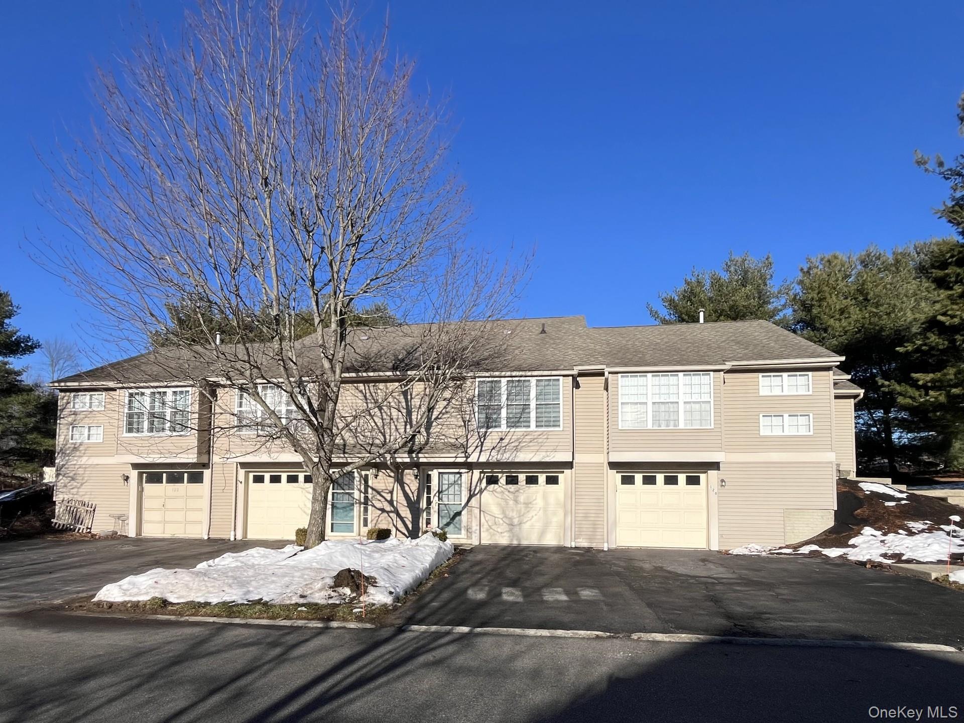 126 Elmcrest Drive Fishkill, NY 12524 - Photo 1 of 1 a front view of a house with a yard