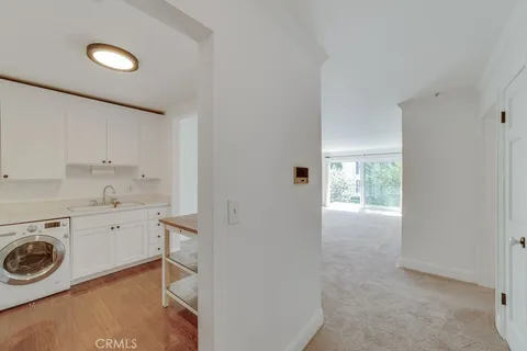 a view of a storage & utility room with washer and dryer