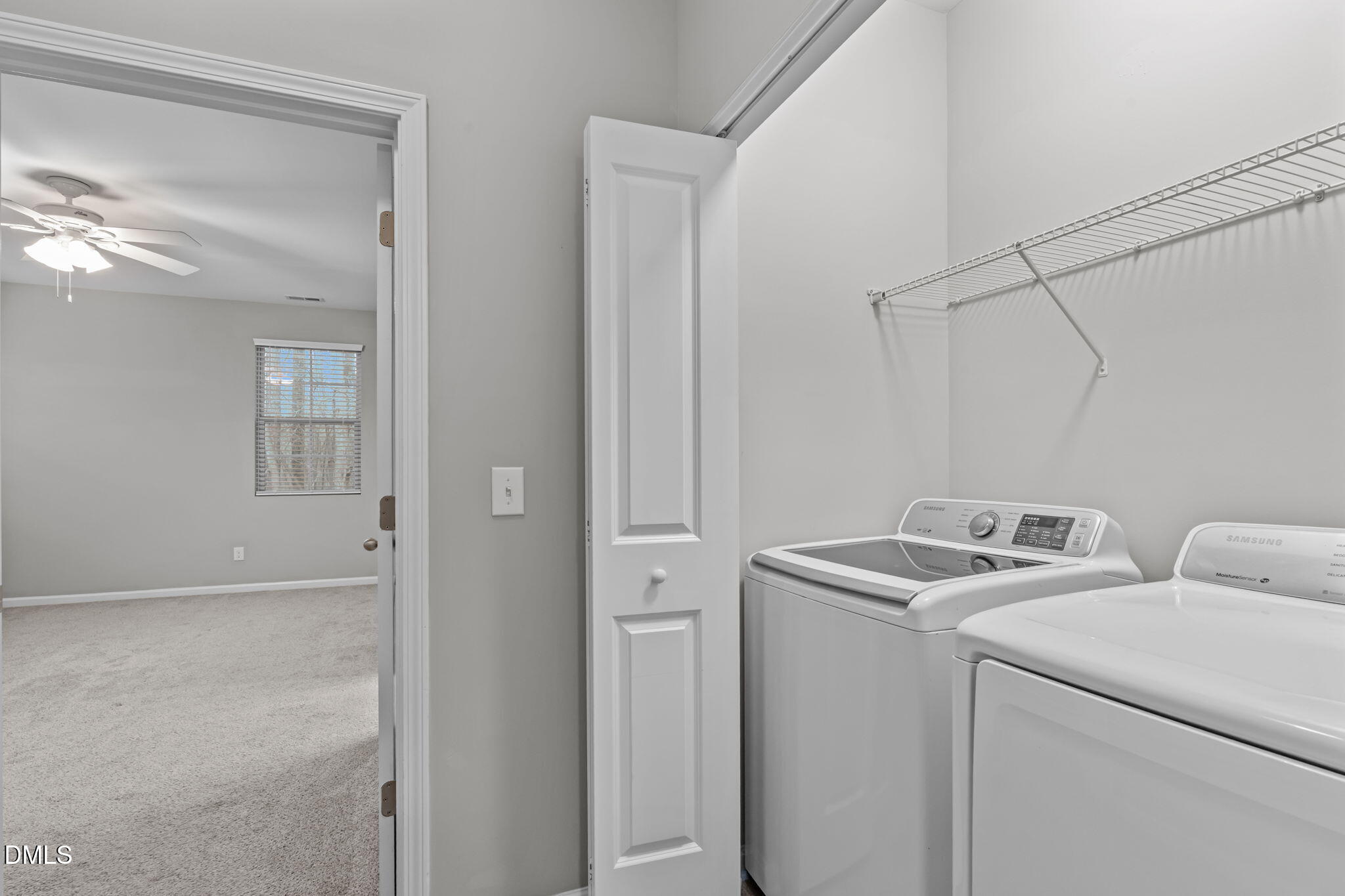 738 Wickham Ridge Road Apex, NC 27539 - Photo 20 of 27 a utility room with dryer and washer
