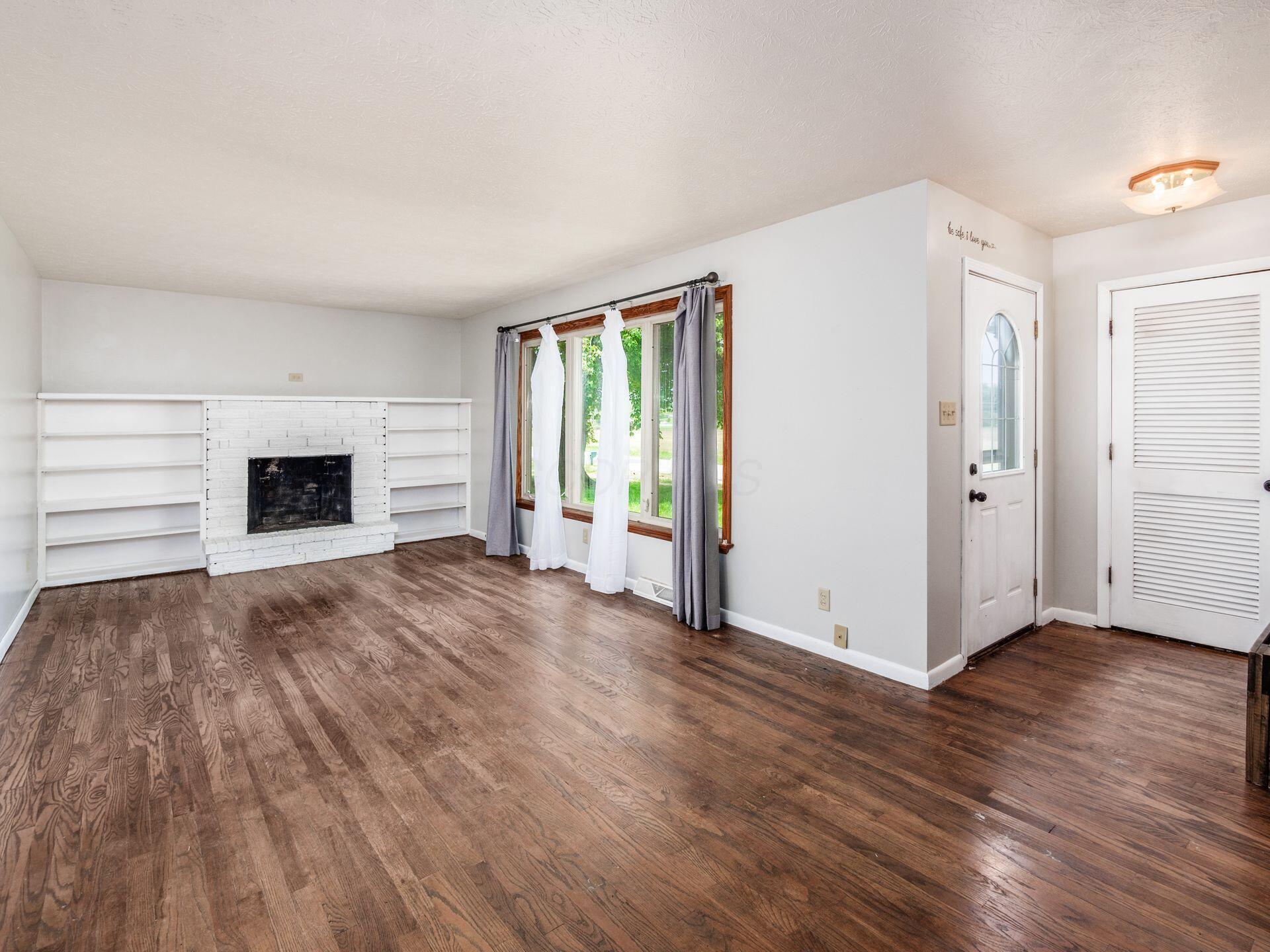 14288 Wooster Road Mount Vernon, OH 43050 - Photo 4 of 45 Living room hardwood floors
