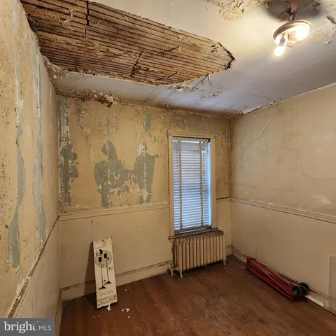 a bathroom with a sink toilet and mirror
