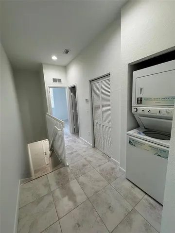a bathroom with a toilet sink and tub
