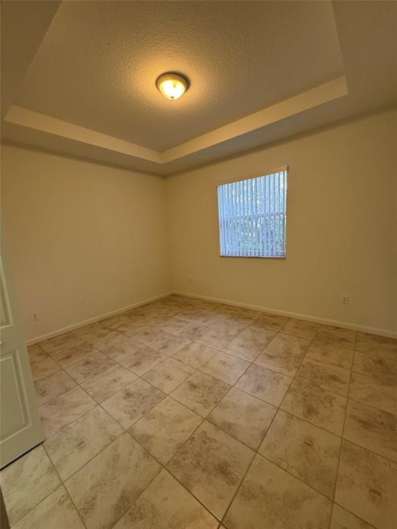 4903 Southwest 140th Terrace Miramar, FL 33027 - Photo 15 of 18 a view of an empty room