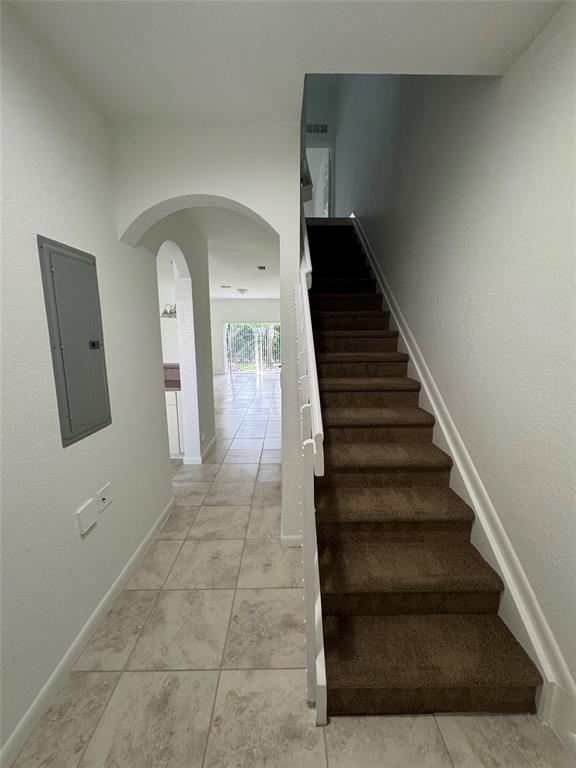 4903 Southwest 140th Terrace Miramar, FL 33027 - Photo 2 of 18 a view of entryway and hall with wooden floor
