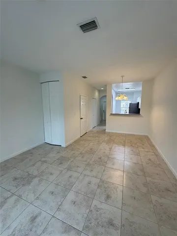 a view of an empty room and window