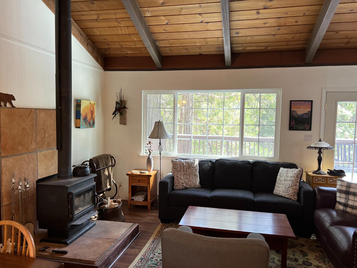 26445 Crystal Road Long Barn, CA 95335 - Photo 3 of 22 a living room with furniture and a window