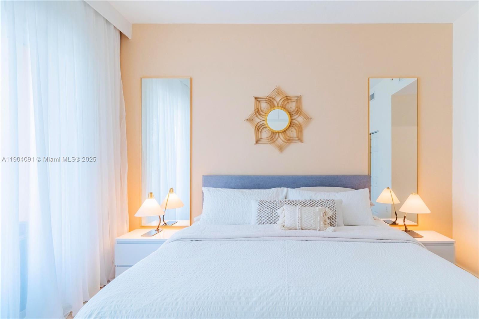 802 West Windward Way, Unit 411 Lantana, FL 33462 - Photo 16 of 42 a view of a bedroom with bed and book shelf