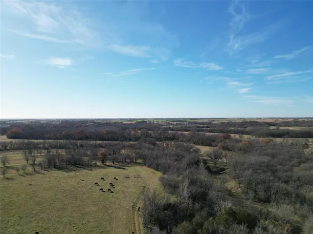 a view of lake with mountain in the background