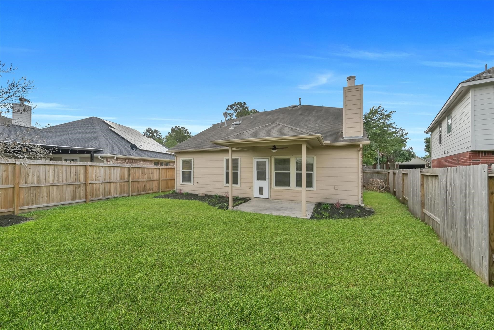 1443 Meadowhigh Lane Spring, TX 77373 - Photo 23 of 23 a view of a house with a yard and sitting area