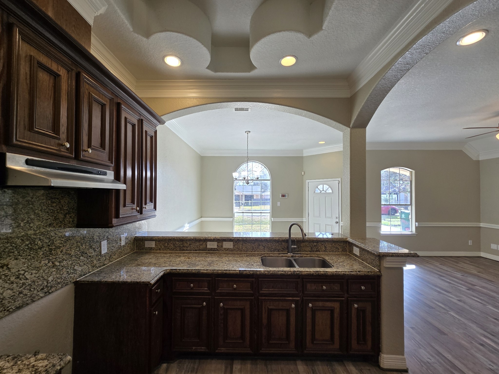 6324 Anderson Road, Unit A Houston, TX 77085 - Photo 14 of 18 a bathroom with a sink and a large mirror