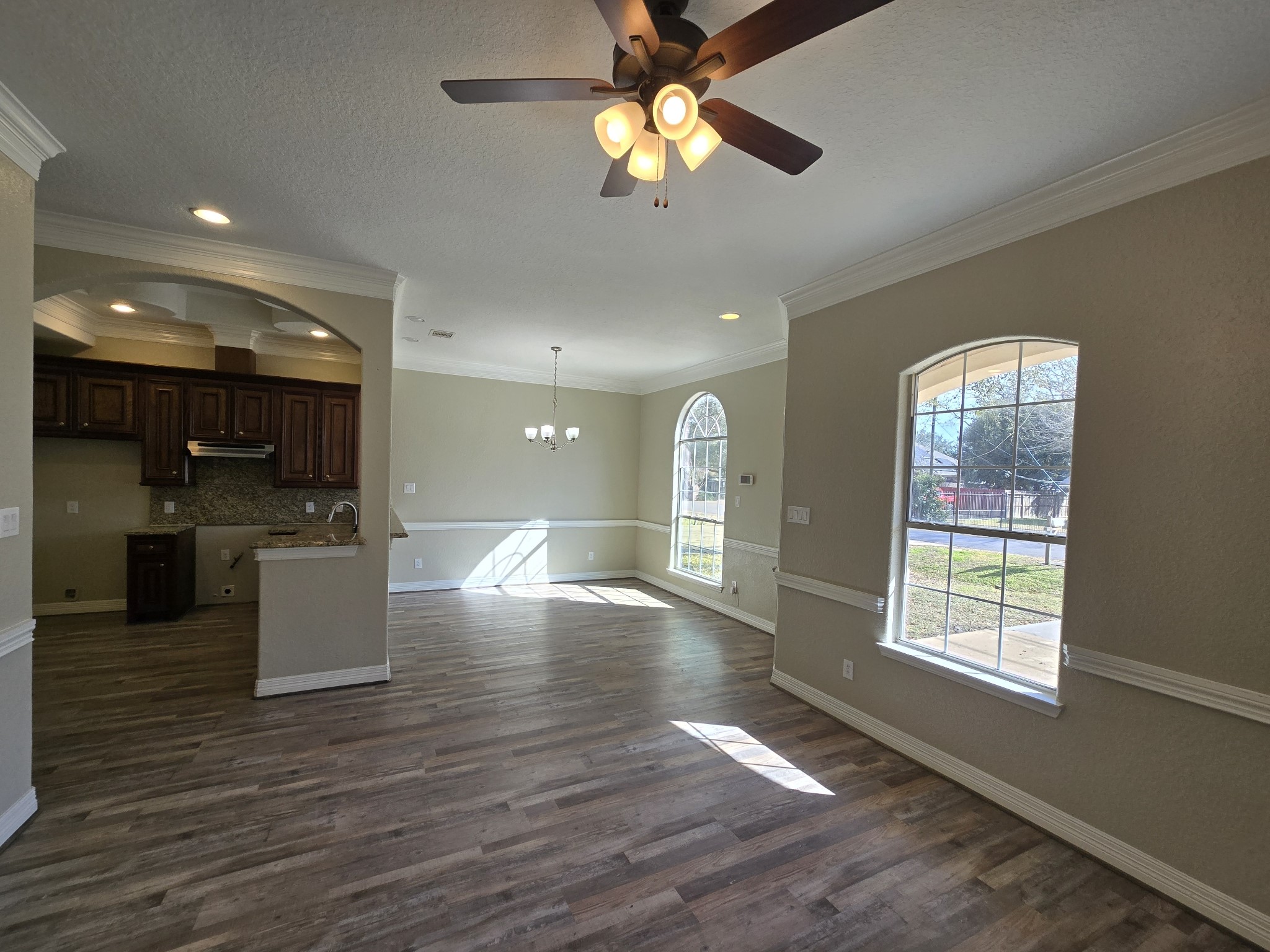 6324 Anderson Road, Unit A Houston, TX 77085 - Photo 16 of 18 an open kitchen with kitchen island stainless steel appliances furniture and a large window